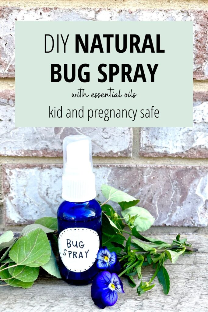 natural bug repellent in blue glass spray bottle