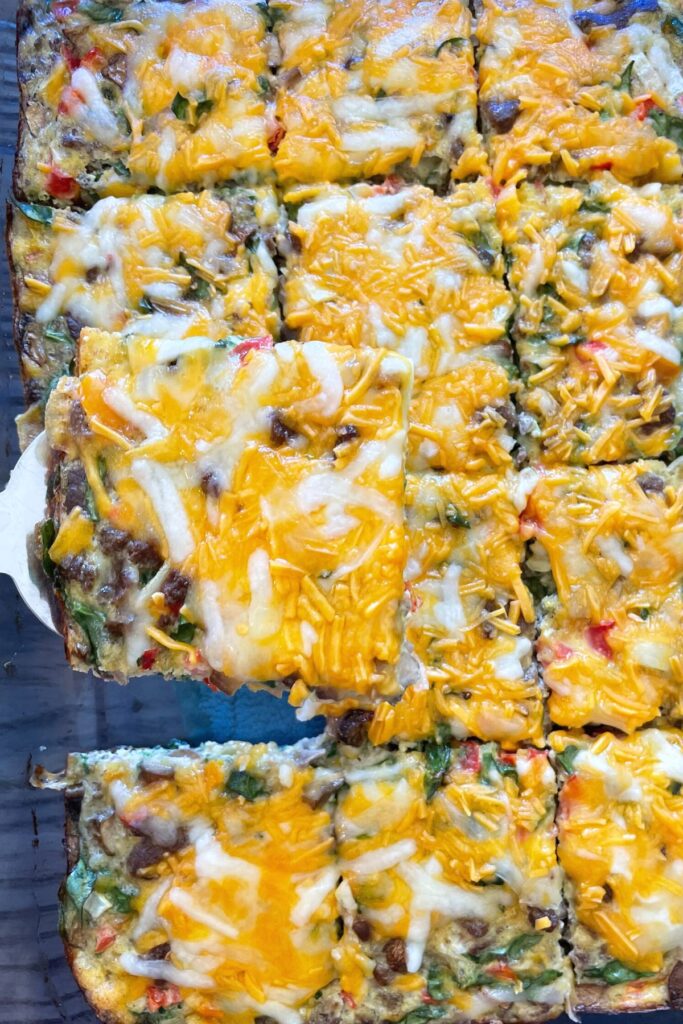 baked egg mixture sliced with cheese on top