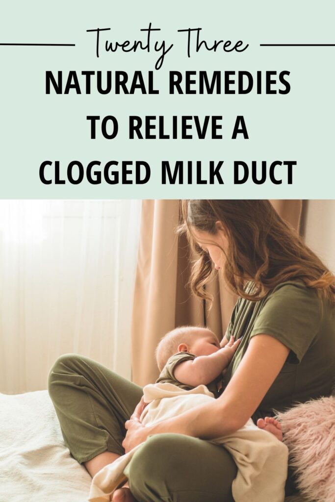 mother breastfeeding her baby on a bed near a window