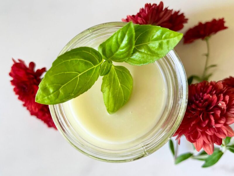 jar of deodorant with leaves and flowers