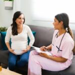 Pregnant woman with provider